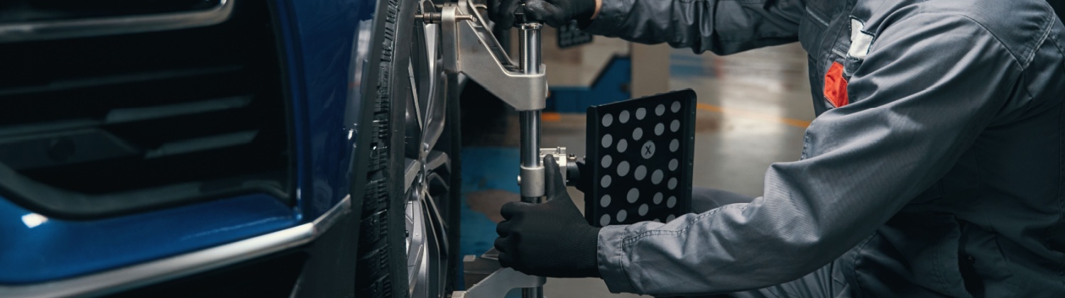 Wheel alignment service at Quarrie Tire & Auto in London, ON for uneven tire wear, off-centre steering wheel, and safer handling.